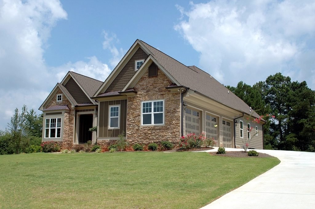 Exterior of a single-family house with a pitched roof, representing a home bought with a mortgage